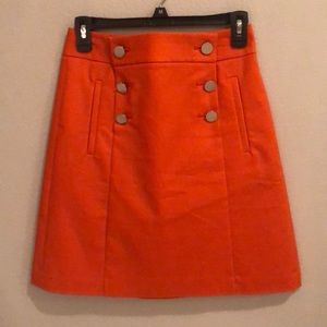 Mid length work skirt with silver buttons